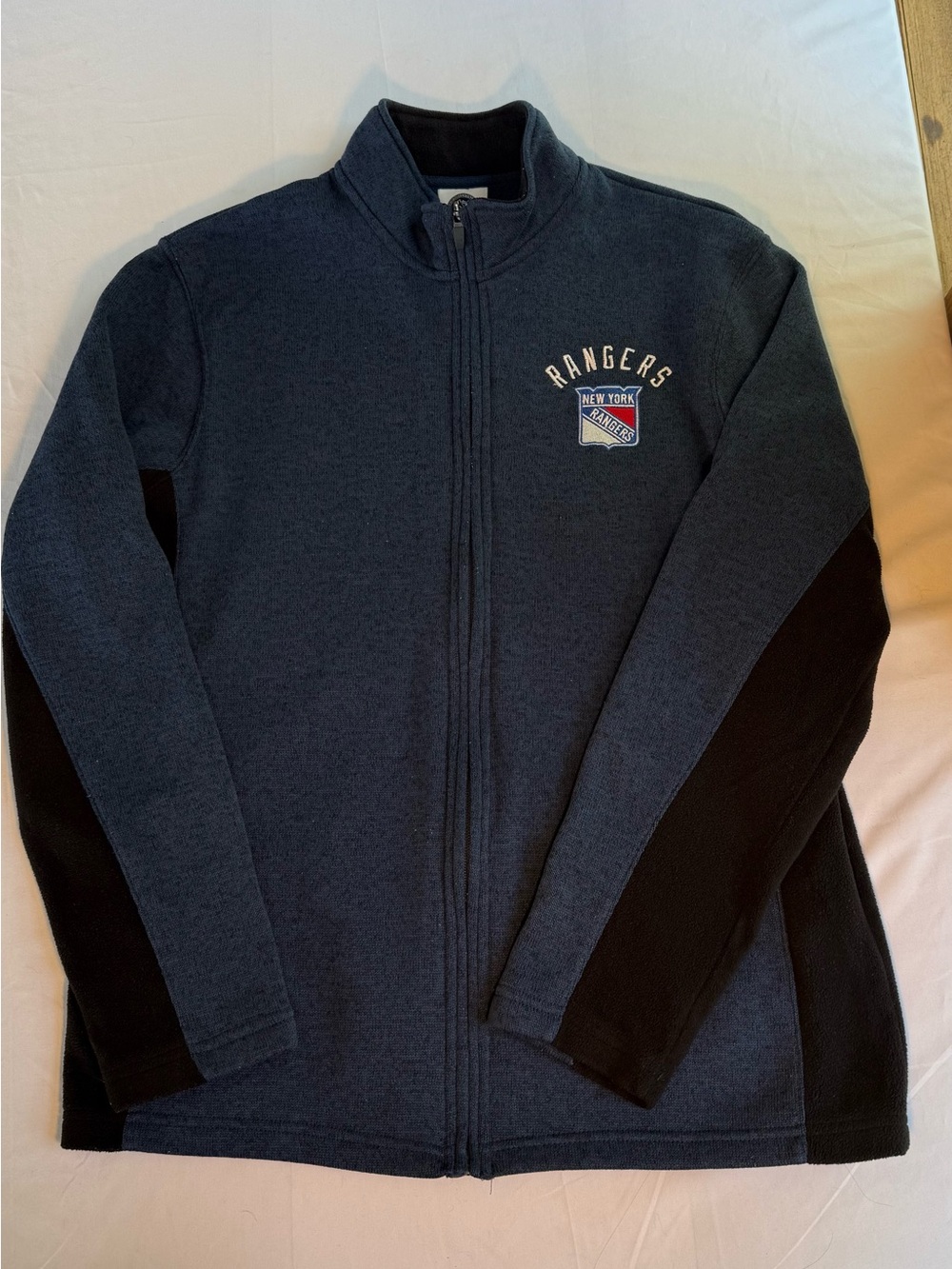 NHL Branded Navy and White Jacket Tag Close-Up
